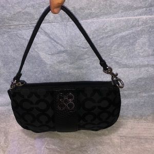 Black coach wristlet with silver hardware